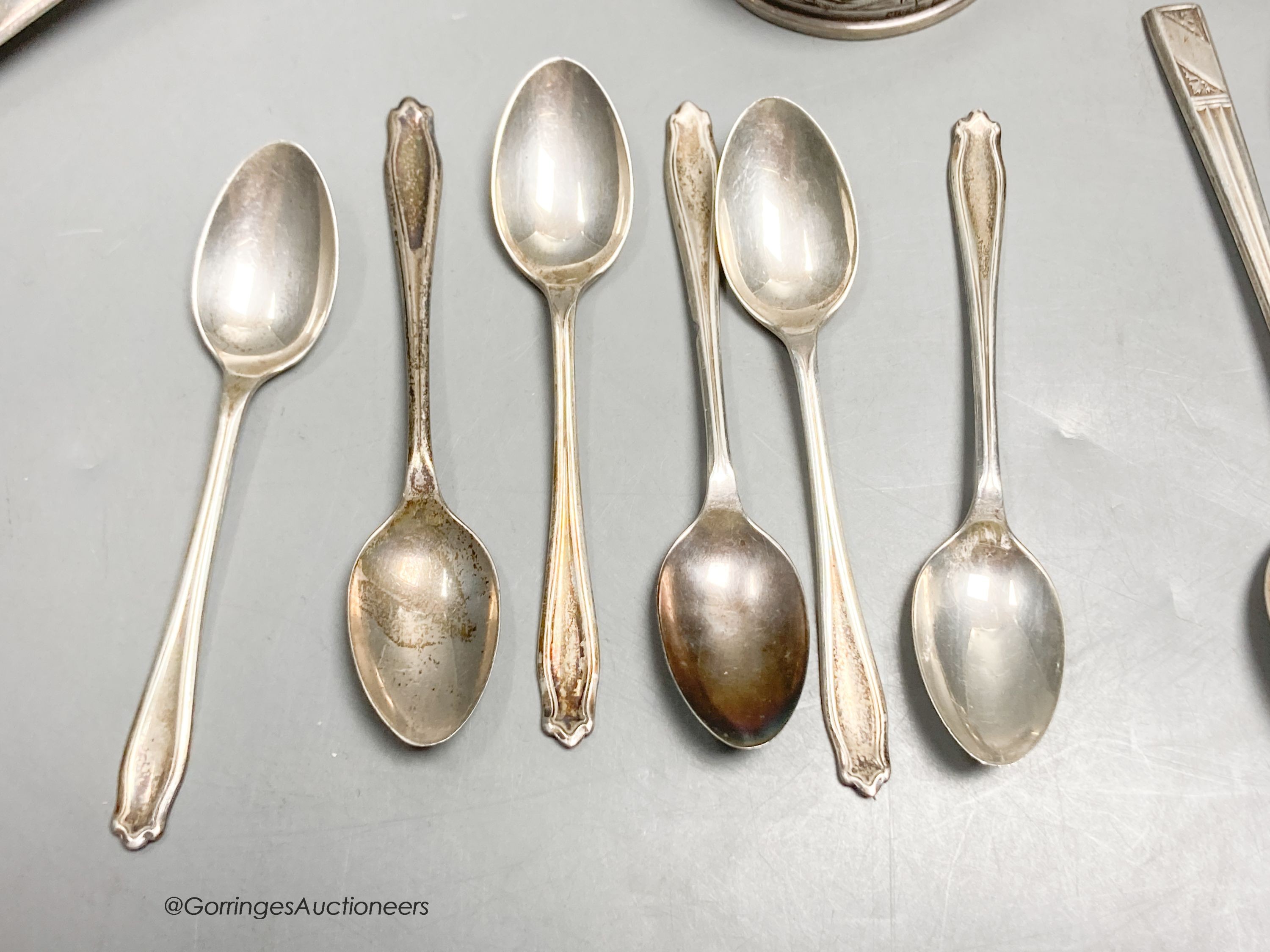 A pair of George III silver tablespoons, a pair of modern silver bottle coasters, a pair of pierced silver bon bon dishes, six silver teaspoons and 6 silver coffee spoons.